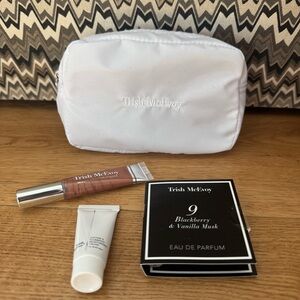 TRISH MCEVOY COSMETIC MAKEUP BAG WITH EAU DE PARFUM LIP GLOSS CREAM SAMPLES
